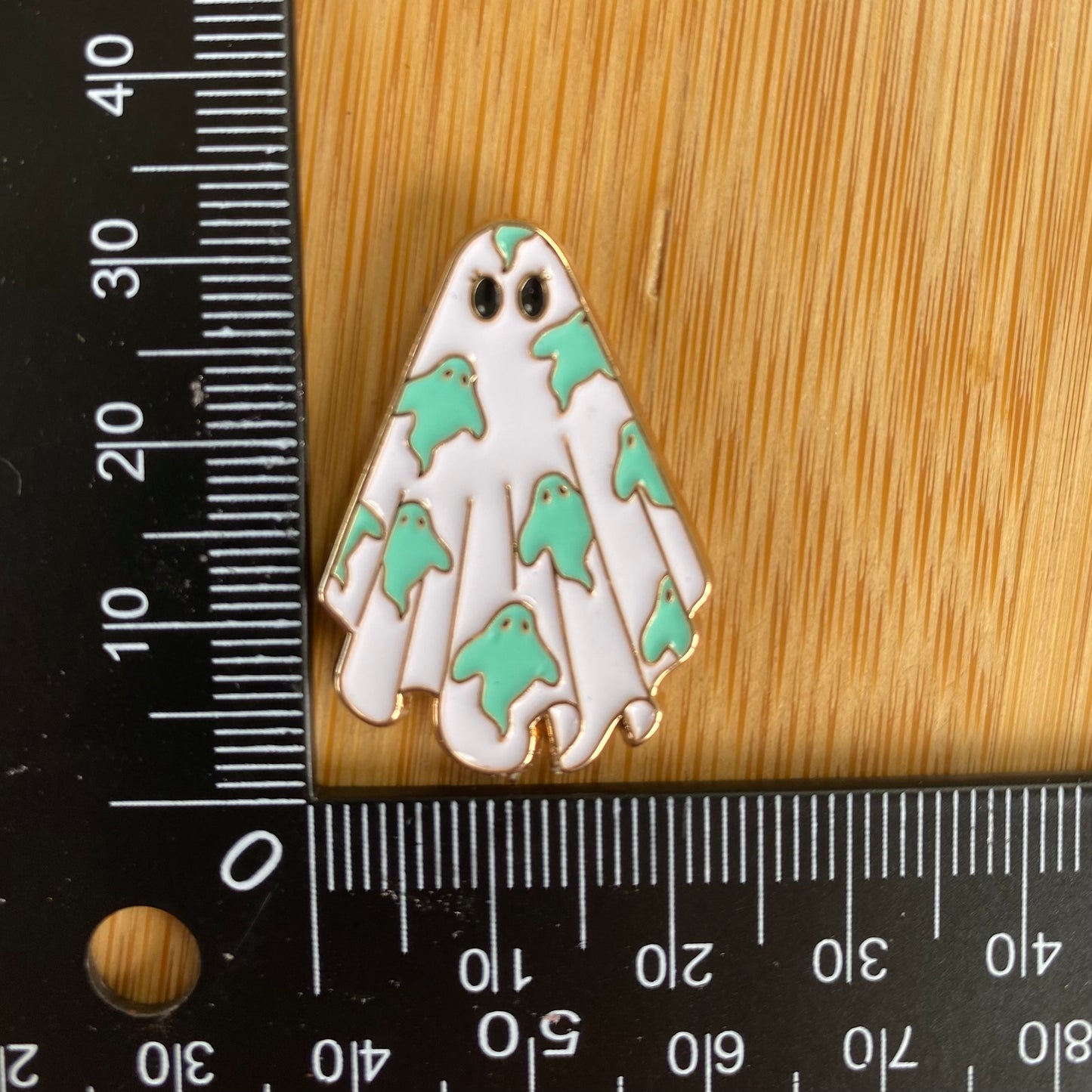 Green Ghost Needle Minder