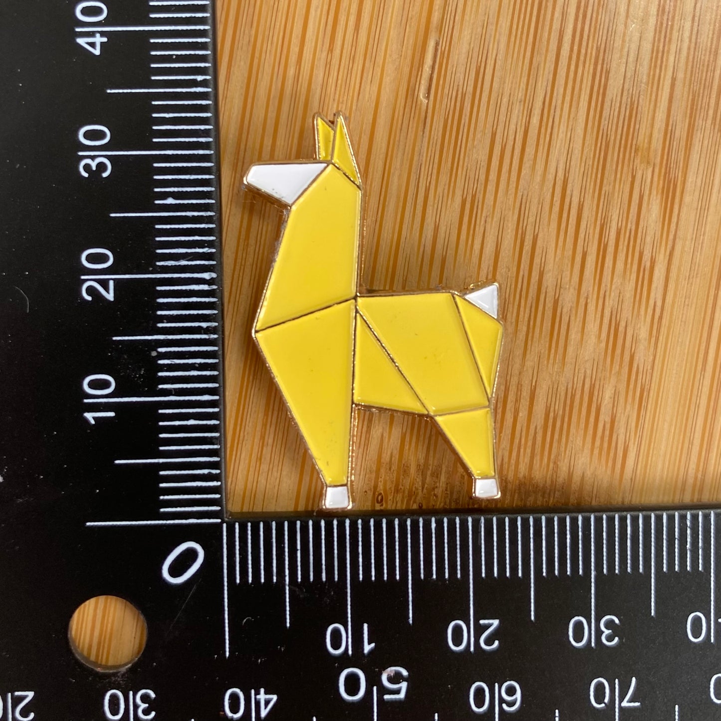 Geometric Llama Needle Minder