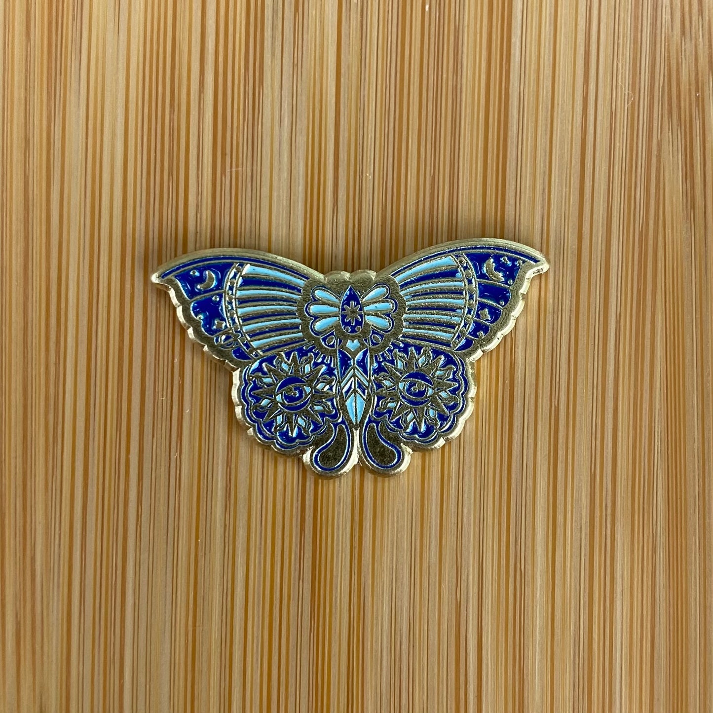 Blue Sun Eyes Moth Needle Minder