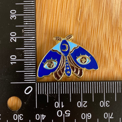 Blue Eye Moth Needle Minder