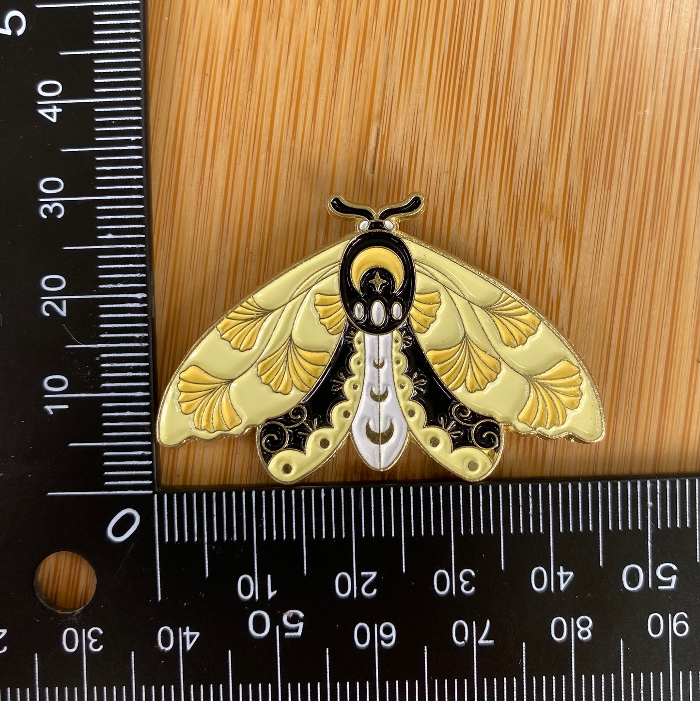 Yellow Flower Moth Needle Minder