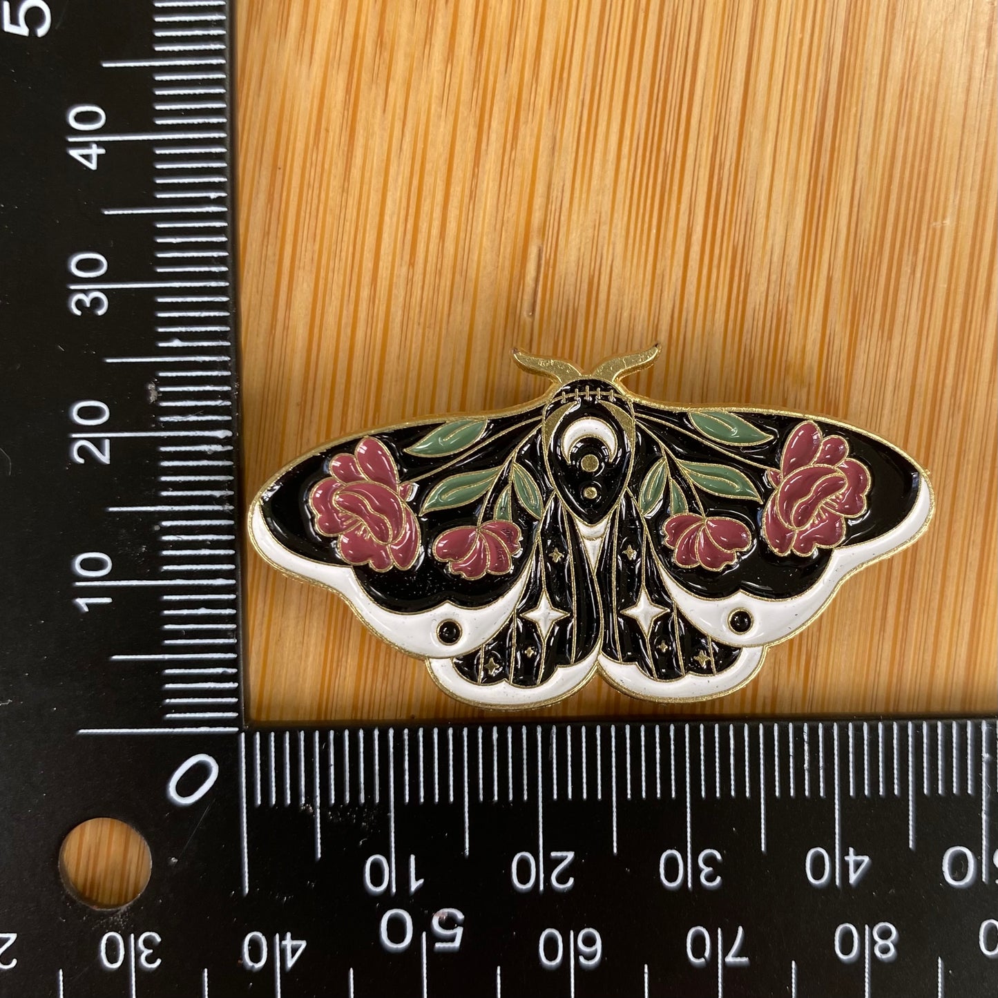 Red Flower Moth Needle Minder